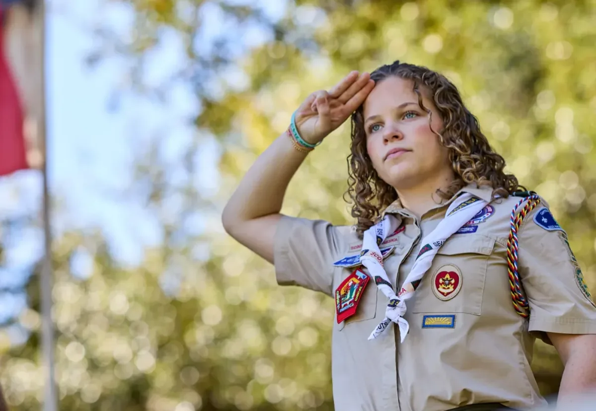 Scout leading a group activity and building leadership skills